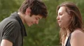 a young couple talking and laughing, the boy holding the girl's hand HD Footage