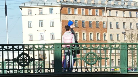 Young Couple Talking to Each Other at Bridge in St. Petersburg, Russia Stock Footage 52327266