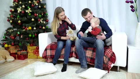 A young couple with a toddler. Stock Footage 72023711