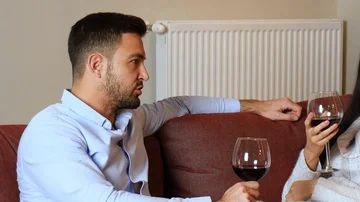 A young couple together on the Sofa Stock Footage 85940298