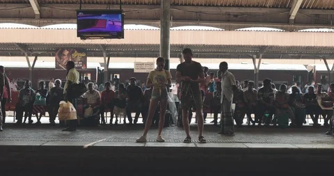 Young couple at train station Stock Footage 109423613