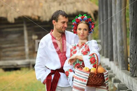 Young couple in Ukrainian style clothes Stock Photos