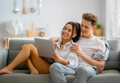 Young couple is using laptop Stock Photos