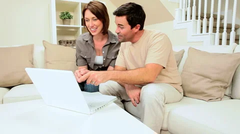 Young Couple Using Online Internet Webchat Stock Footage 3329573