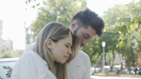 Young couple using smartphone Stock Footage 106323315