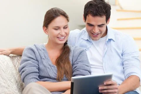 Young couple using a tablet computer Foto stock