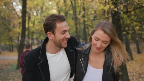 Young couple walk having fun outdoors laughing joyful girl girlfriend nature Stock Footage 102740609