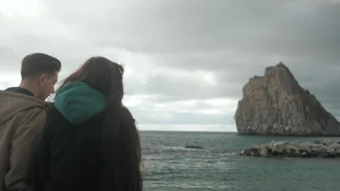 Young couple is walking on the beach. autumn, spring Stock Footage 171451653
