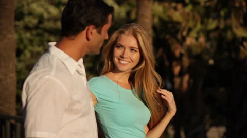 Young couple walking by beach Stock Footage 43615805