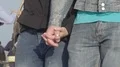 Young couple walking down street holding hands, romantic relationship, love HD Footage