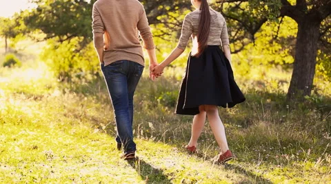 Young couple walking Stock Footage 66622049