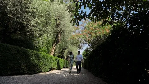 Young Couple Walking In The Garden. Stock-Footage 108014754