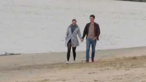 Young Couple walking open air near the river, summer sunny day. Stock Footage 141335232