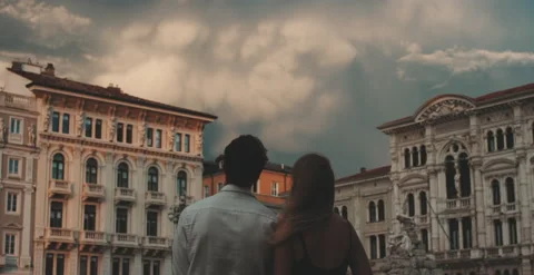 Young couple watching the clouds Stock Footage 204915972