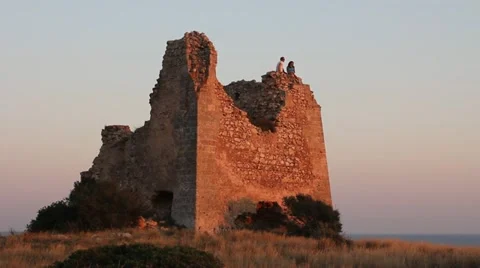 Young couple watching the sunset Stock Footage 12050157