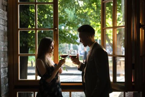 Young couple by the window Stock Photos