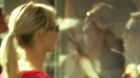A young couple window shopping Stock Footage