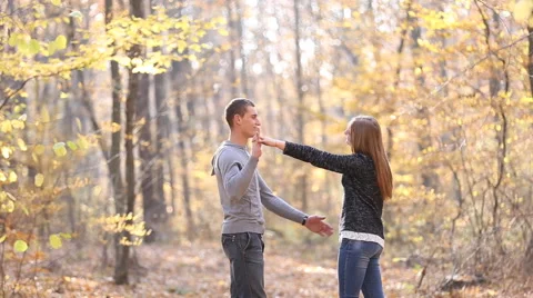 Young couple in the woods Stock Footage 57460768