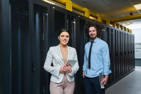Young couple working at a data center Stock Photos
