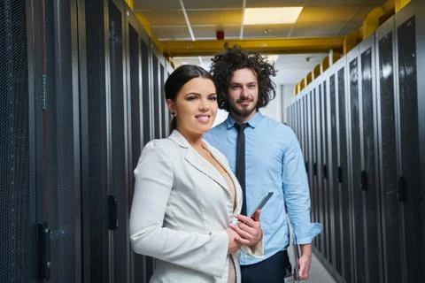 Young couple working at a data center Stock Photos
