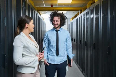 Young couple working at a data center Stock Photos