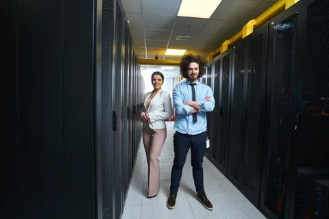 Young couple working at a data center Stock Photos