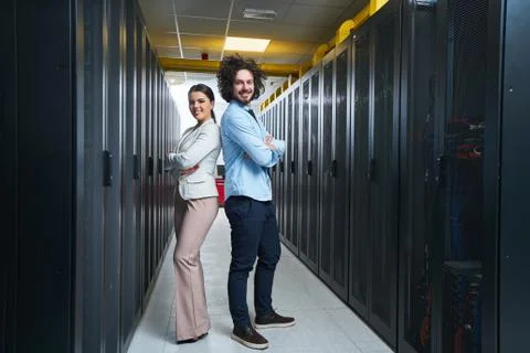 Young couple working at a data center Stock Photos