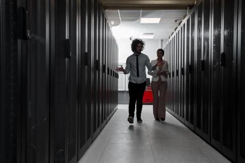 Young couple working at a data center Stock Photos
