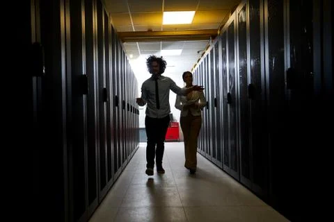 Young couple working at a data center Stock Photos