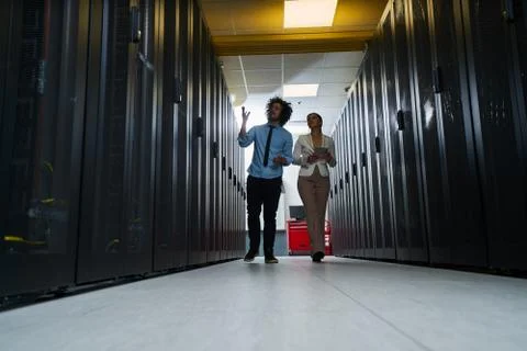 Young couple working at a data center Stock Photos
