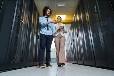 Young couple working at a data center Stock Photos