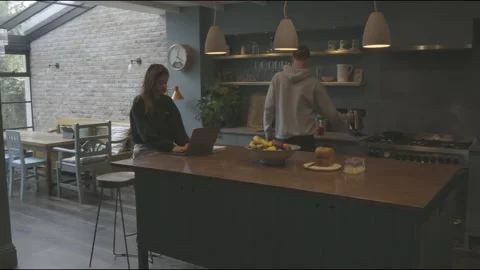 Young couple working from home Stock Footage 132568176