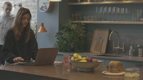 Young couple working from home Stock Footage 132569704