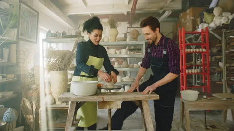 Young Couple Is Working In Pottery Stock Footage 169055220