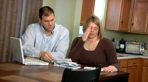 Young Couple Worried About Bills Stock Footage