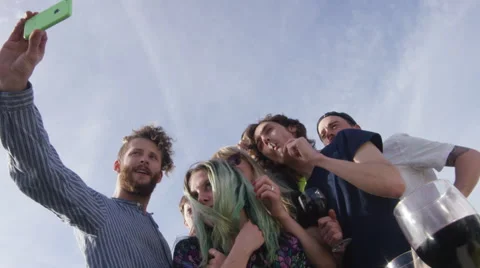 Young couples and friends posing for a group selfie Stock Footage 58581826