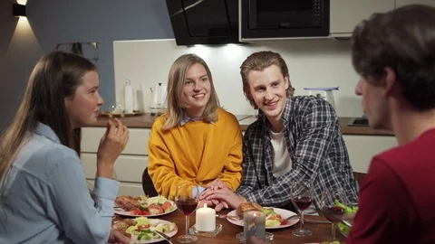 Young couples having fun at dinner Stock Footage 114811329