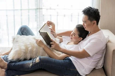 Young Couples reading book Stock Photos