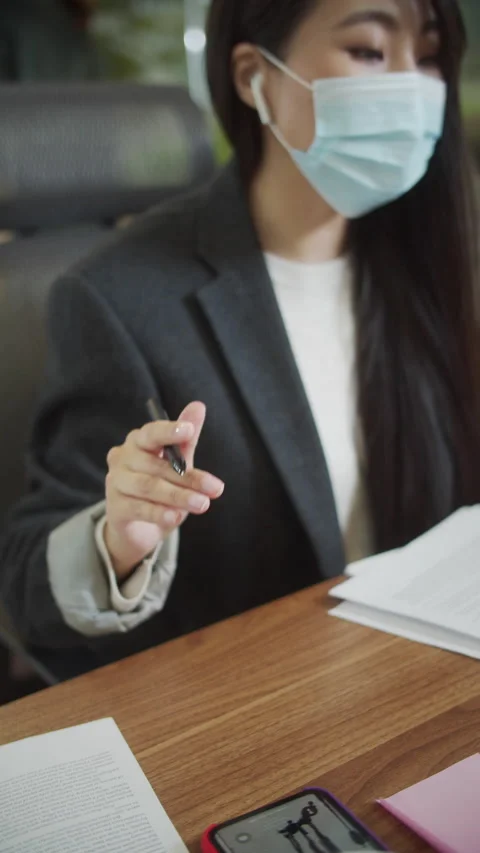 A young coworker is talking with someone on the Internet Stock Footage 159346248