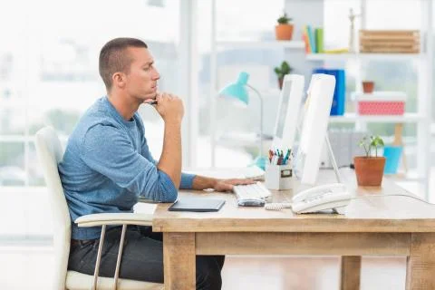 Young creative businessman working on the computer 스톡 사진