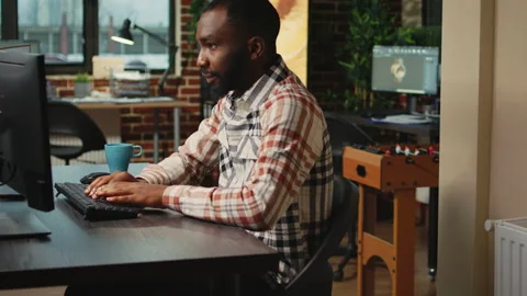 Young creative developer working on 3d engineering or cgi Video stock 229815405