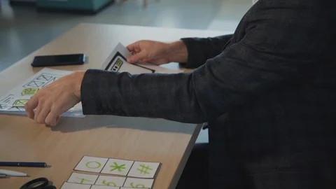 Young creative marketer analyzing startup project sitting at table in office Stock Footage 115651282