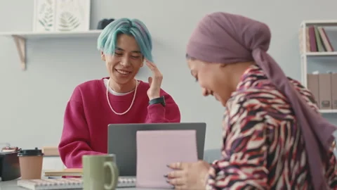 Young Creative Programmers Chatting at Workplace Stock Footage 241263289