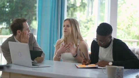 Young creative team making decisions working from home remote Video stock 89870636