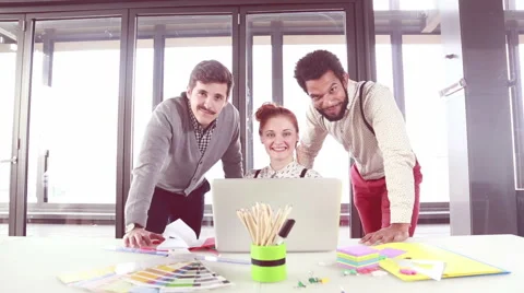 Young creative team smiling and looking at camera Video stock 59543911
