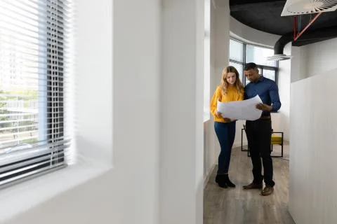 Young creatives working in a modern office 写真素材