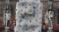 Young Cute Boy and Girl Try to Climb Rock Wall Munich Competition Kids Learning HD Footage