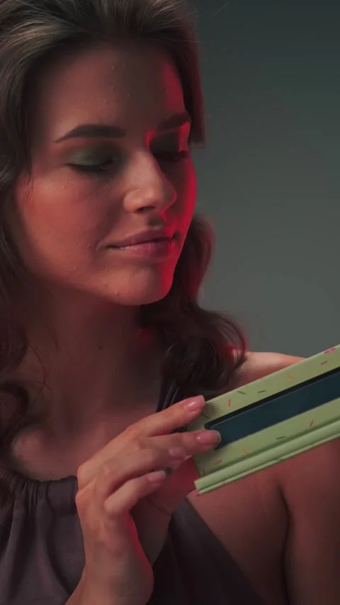Young cute model with long hair showing set for professional makeup Stock Footage 307901192