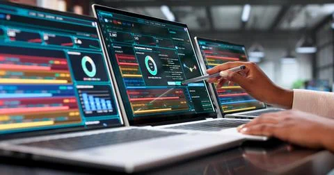 Young Cybersecurity Analyst Monitors Network Threats Using Advanced Software  스톡 사진