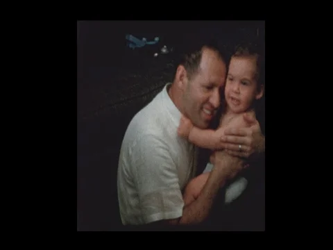 Young dad kisses loves and plays with baby son 1960 Stock Footage 71659138